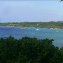 VIEW FROM THE BLOOD COMPACT SITE - In the distance is Panglao Island where beautiful beaches abound. It is heavily commercialized that you need to be booked to enjoy its white sandy beaches.